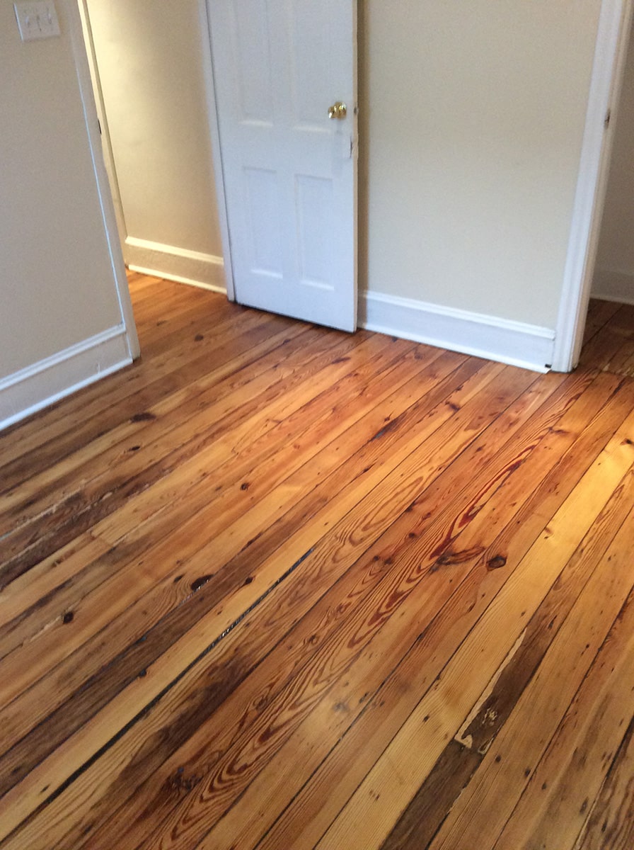 damaged hardwood floor needing Floor Repairs